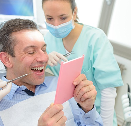 Implant bridges secure to the jaw via dental implants