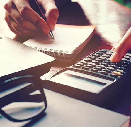 Woman using a calculator